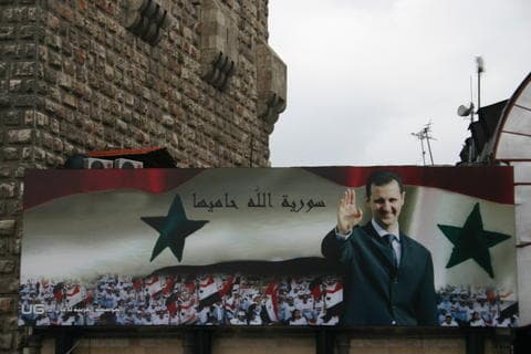 صورة منافسة حادة في الانتخابات السورية بين الأسد
