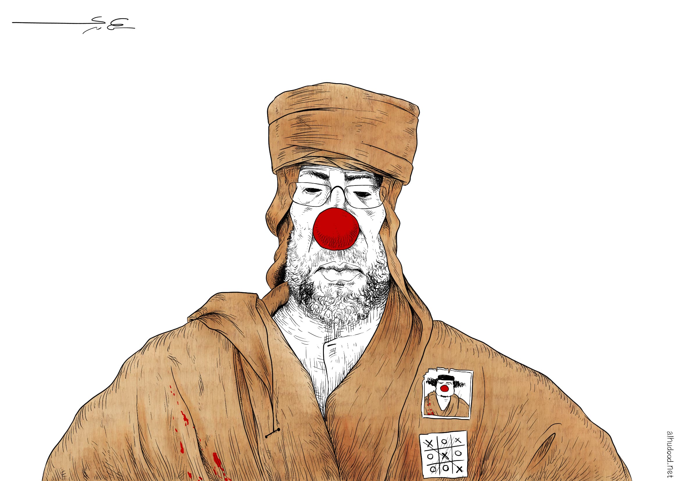 صورة القذافي الصغير يرتدي ثياب والده