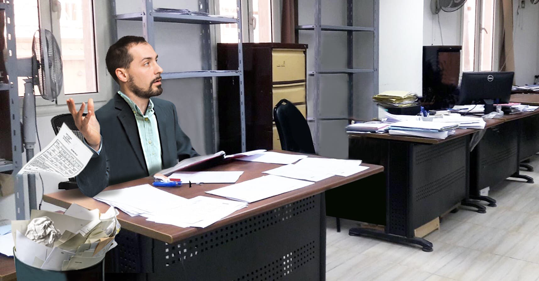 صورة موظّف حكومي يؤجّل معاملة اليوم إلى الغد