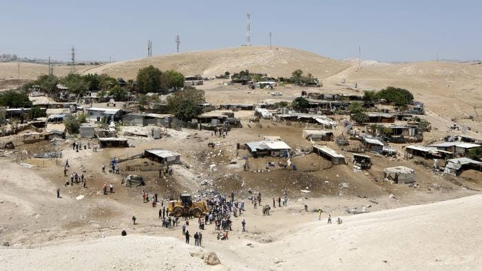 Israel uproots freak Palestinian village that appeared between two historic settlements image