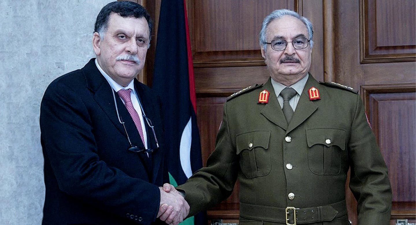 صورة السرّاج وحفتر يتوصلان لاتفاق لم يُفصحا عنه للشعب الليبي لكونه شأناً داخلياً لا يخصه